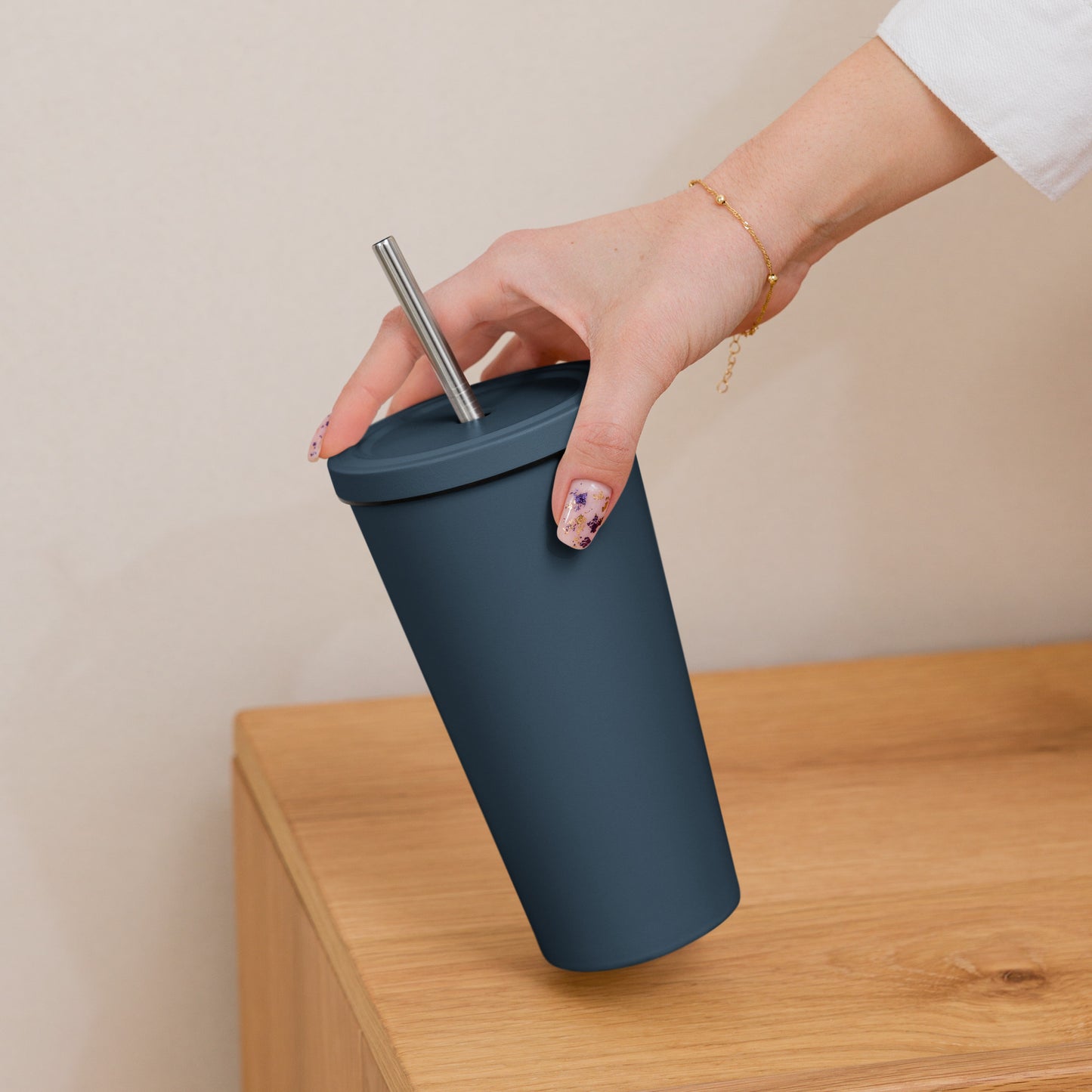 Insulated tumbler with a straw